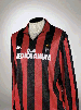 A RED AND BLACK A.C. MILAN SHIRT A RED AND BLACK A.C. MILAN SHIRT