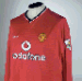 A RED MANCHESTER UNITED SHIRT A RED MANCHESTER UNITED SHIRT