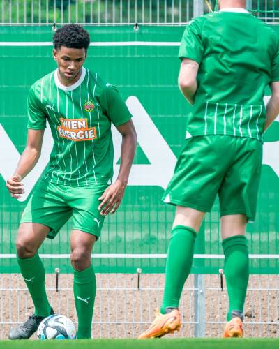 rapid_wien_2023_24_puma_home_kit_e.jpeg