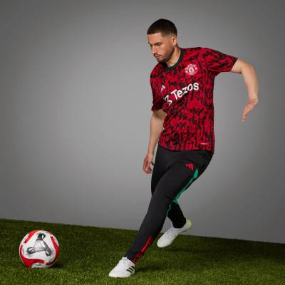 manchester_united_2023_24_pre_match_jersey_mufc_red_black_e1.jpg