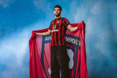 bournemouth_2023_24_umbro_home_kit_a.jpeg