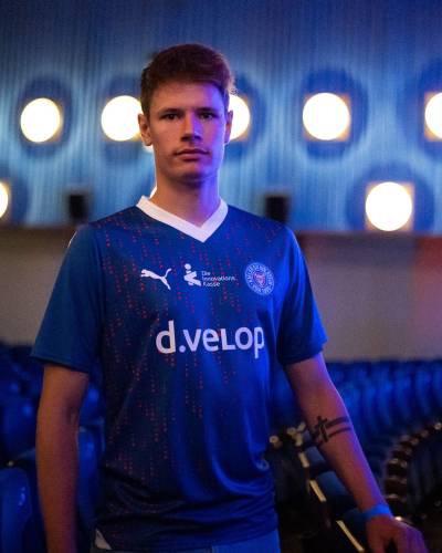 holstein_kiel_2023_24_puma_home_and_away_kits_a.jpeg