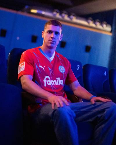 holstein_kiel_2023_24_puma_home_and_away_kits_b.jpeg