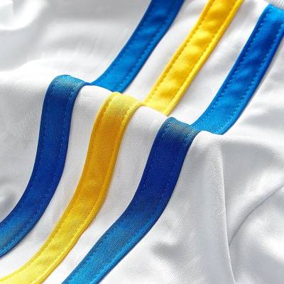 leeds_united_2023_24_adidas_home_kit_i.jpg