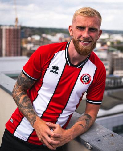 sheffield_united_2023_24_errea_home_kit_a.jpeg