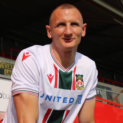 wrexham_2023_24_macron_away_kit_e.jpeg