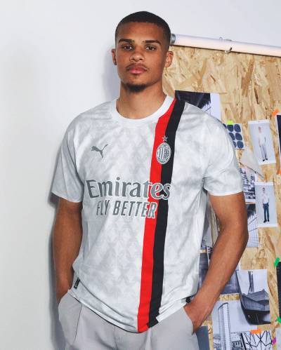 ac_milan_2023_24_puma_away_kit_a.jpeg