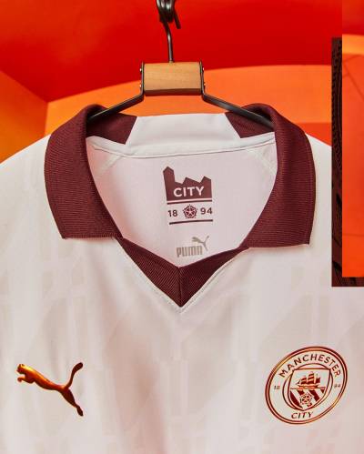 manchester_city_2023_24_puma_away_kit_a.jpeg