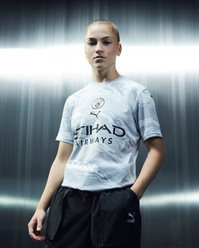 manchester_city_2024_puma_year_of_the_dragon_jersey_a.jpeg