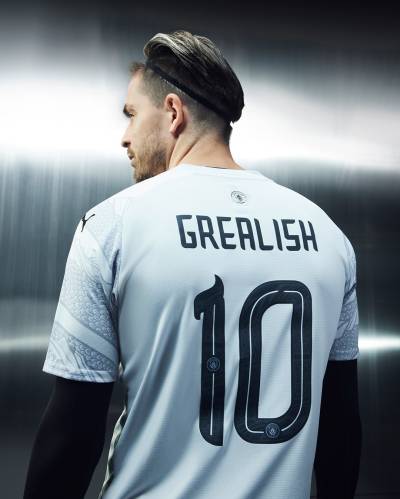 manchester_city_2024_puma_year_of_the_dragon_jersey_d.jpeg