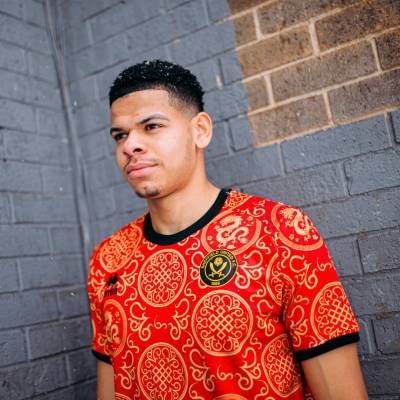 sheffield_united_2023_2024_errea_year_of_the_dragon_pre_match_tops_2.jpg