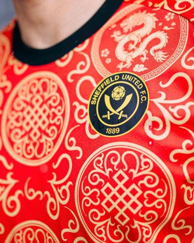 sheffield_united_2023_2024_errea_year_of_the_dragon_pre_match_tops_3.jpg