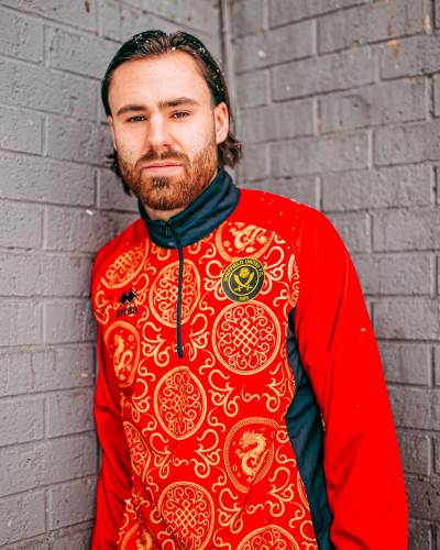 sheffield_united_2023_2024_errea_year_of_the_dragon_pre_match_tops_4.jpg