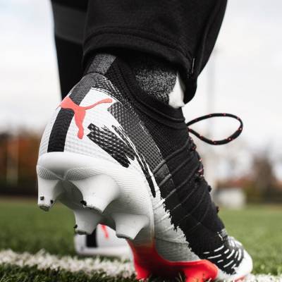 puma_unisport_Future_1_4_fg_ag_ran_out_of_ink_white_fiery_coral_black_2a.jpeg