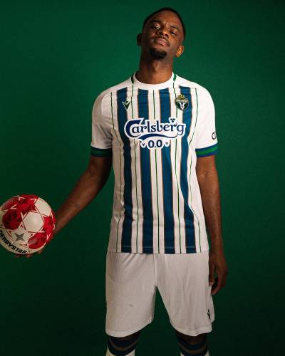 york_united_2024_macron_home_kit_a.jpeg