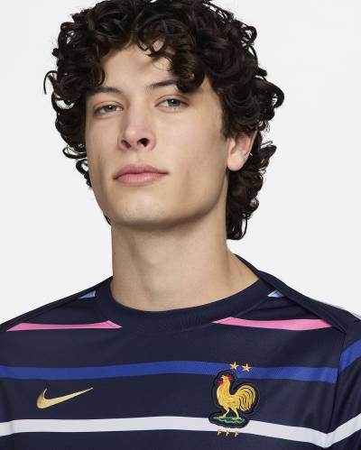 france_2024_nike_pre_match_shirt_blackened_blue_club_gold_&_wonderful_war_child_umbro_pre_match_shirt_3.jpeg