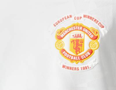 manchester_united_1991_european_cup_winners_cup_reissue_away_shirt_e.jpeg