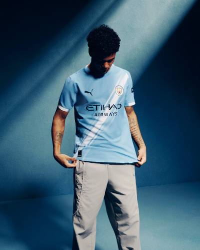manchester_city_2025_26_puma_home_kit_e.jpg