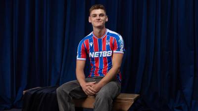 crystal_palace_25_26_macron_home_kit_a.jpg