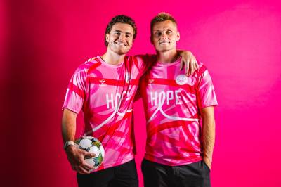 charleston_battery_2025_hummel_pink_october_warm_up_shirt_a.jpg