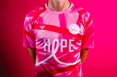 charleston_battery_2025_hummel_pink_october_warm_up_shirt_b.jpg