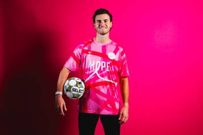 charleston_battery_2025_hummel_pink_october_warm_up_shirt_d.jpg