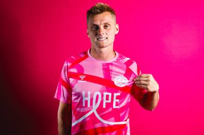 charleston_battery_2025_hummel_pink_october_warm_up_shirt_e.jpg