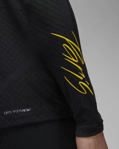 Paris_Saint_Germain_Strike_Elite_Fourth_Jordan_Dri_FIT_ADV_Football_Drill_Top_Black_Tour_Yellow_Tour_Yellow_6.jpeg