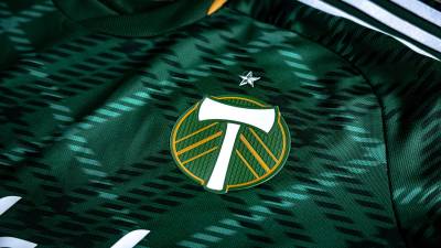portland_timbers_2023_2024_adidas_home_kit_l.jpeg