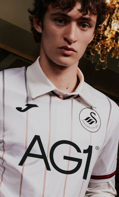 swansea_city_26_27_joma_home_kit_a.jpeg