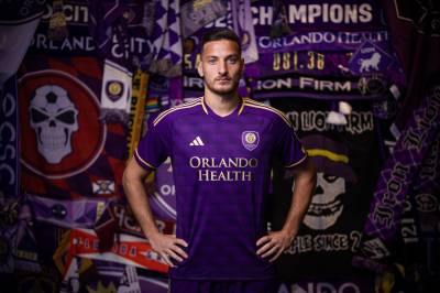 orlando_city_2023_2024_adidas_home_kit_a.jpeg