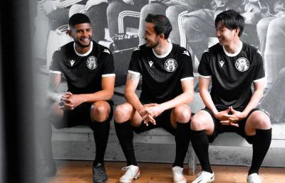arminia_bielefeld_2023_macron_commemorative_jersey_f.jpg