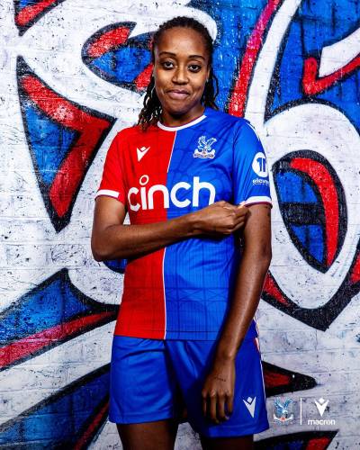 crystal_palace_2023_24_macron_home_kit_a.jpeg