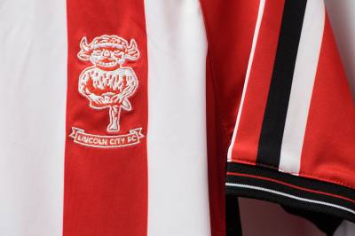 lincoln_city_2023_24_oxen_home_kit_b1.jpeg