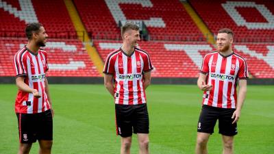 lincoln_city_2023_24_oxen_home_kit_f.jpeg
