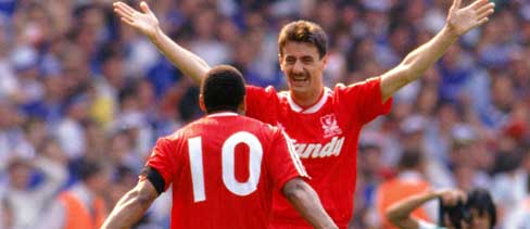 Ian Rush celebrates another FA Cup Final goal with John Barnes. Ian Rush celebrates another FA Cup Final goal with John Barnes.