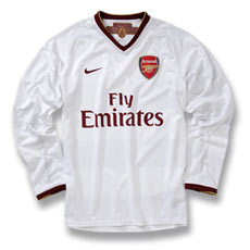 The shirt incorporates a tonal print in a horizontal stripe, detailing many of Chapman’s groundbreaking innovations which among others include the introduction of the white ball, rubber studs and numbered shirts