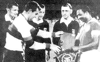 Glentoran's finest hour came in a European Cup encounter with Benfica in 1967. The tie was played over two legs, the first being at the Oval. Glentoran scored a penalty early on and held out for nearly 60 minutes until football great Eusébio equalised. The match ended 1-1. The return tie was at Benfica's famous Estádio da Luz. Part-time Glentoran were expected to crumble under the pressure of the occasion, but again held out for a famous draw. Benfica advanced to the next round on the away goals rule. Glentoran were the first team ever to lose out to this rule. Glentoran's finest hour came in a European Cup encounter with Benfica in 1967. The tie was played over two legs, the first being at the Oval. Glentoran scored a penalty early on and held out for nearly 60 minutes until football great Eusébio equalised. The match ended 1-1. The return tie was at Benfica's famous Estádio da Luz. Part-time Glentoran were expected to crumble under the pressure of the occasion, but again held out for a famous draw. Benfica advanced to the next round on the away goals rule. Glentoran were the first team ever to lose out to this rule.