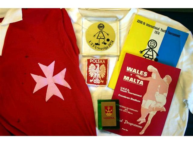 322. International Shirts Etc: A white crew neck long-sleeve shirt with Poland badge to front, No. 8 to rear plus itinerary & exchange gifts etc. also a red with white trim shirt with Maltese crest to front, No. 6 to rear plus programme. &pound;120-150