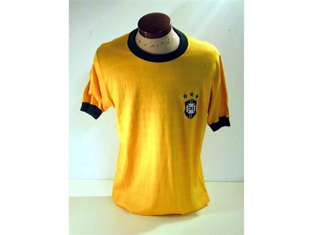 458. Brazil International Shirt: A yellow with green trim crew neck shirt with embroidered Brazil crest & 3 stars above to front, No. 2 to rear. 458. Brazil International Shirt: A yellow with green trim crew neck shirt with embroidered Brazil crest & 3 stars above to front, No. 2 to rear.