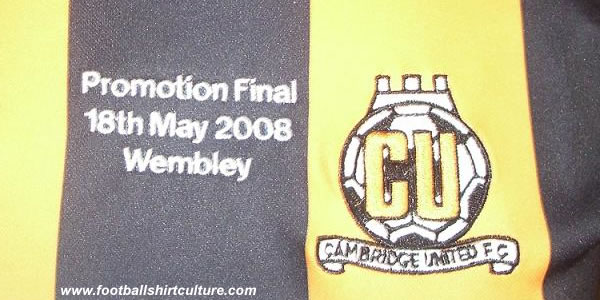 Cambridge United unveiled some special Play-off items, including a limited supply of embroidered commemorative Play-off Final home shirts Cambridge United unveiled some special Play-off items, including a limited supply of embroidered commemorative Play-off Final home shirts
